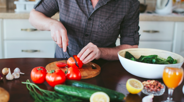 Men Holding Their Own In The  Kitchen